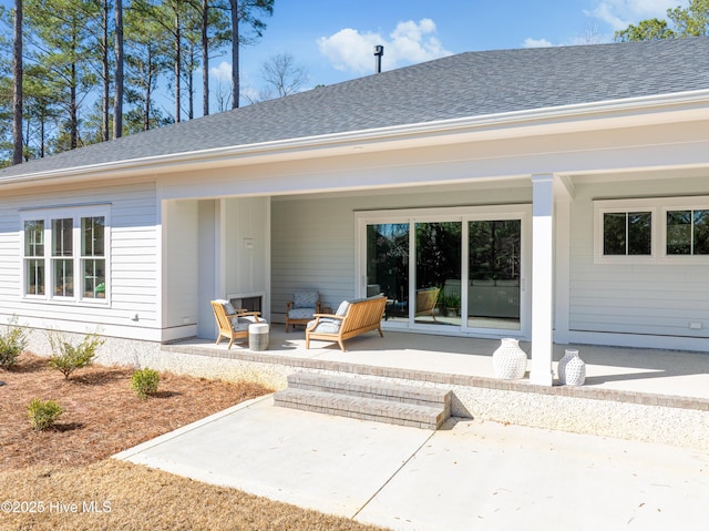 3772 Barnesmore Dr, Castle Hayne, NC 28429 - back of property with a shingled roof and a patio area