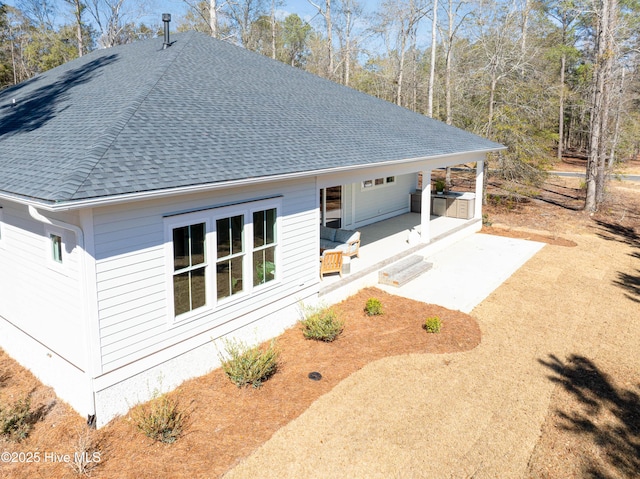3772 Barnesmore Dr, Castle Hayne, NC 28429 - back of house with a shingled roof and a patio area