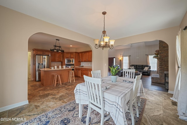 dining room featuring a notable chandelier