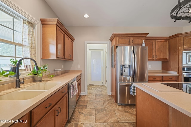 kitchen featuring stainless steel appliances and sink