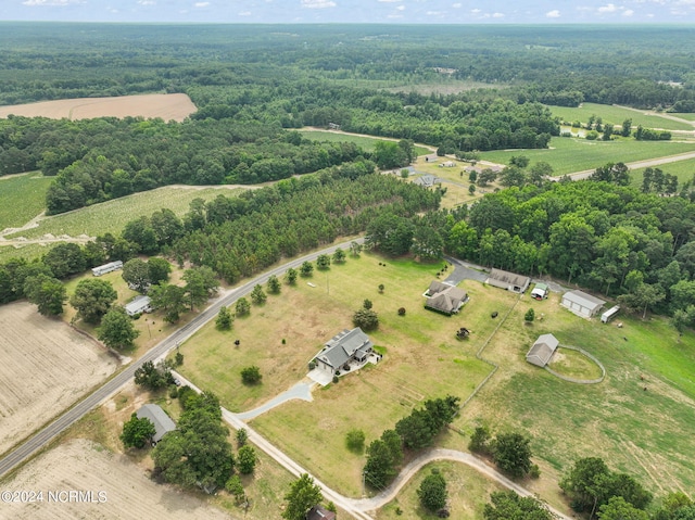 birds eye view of property with a rural view