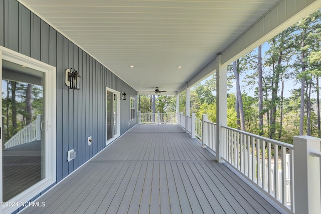 wooden terrace featuring ceiling fan