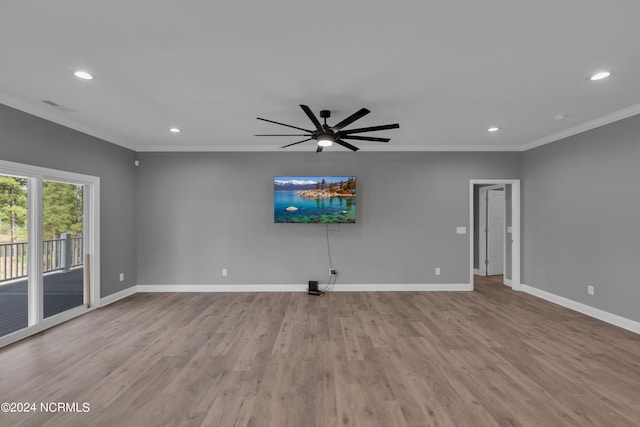 unfurnished living room with crown molding, ceiling fan, and light hardwood / wood-style flooring