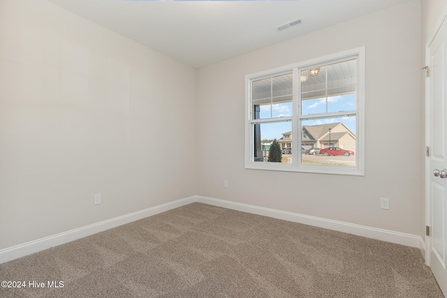 view of carpeted spare room