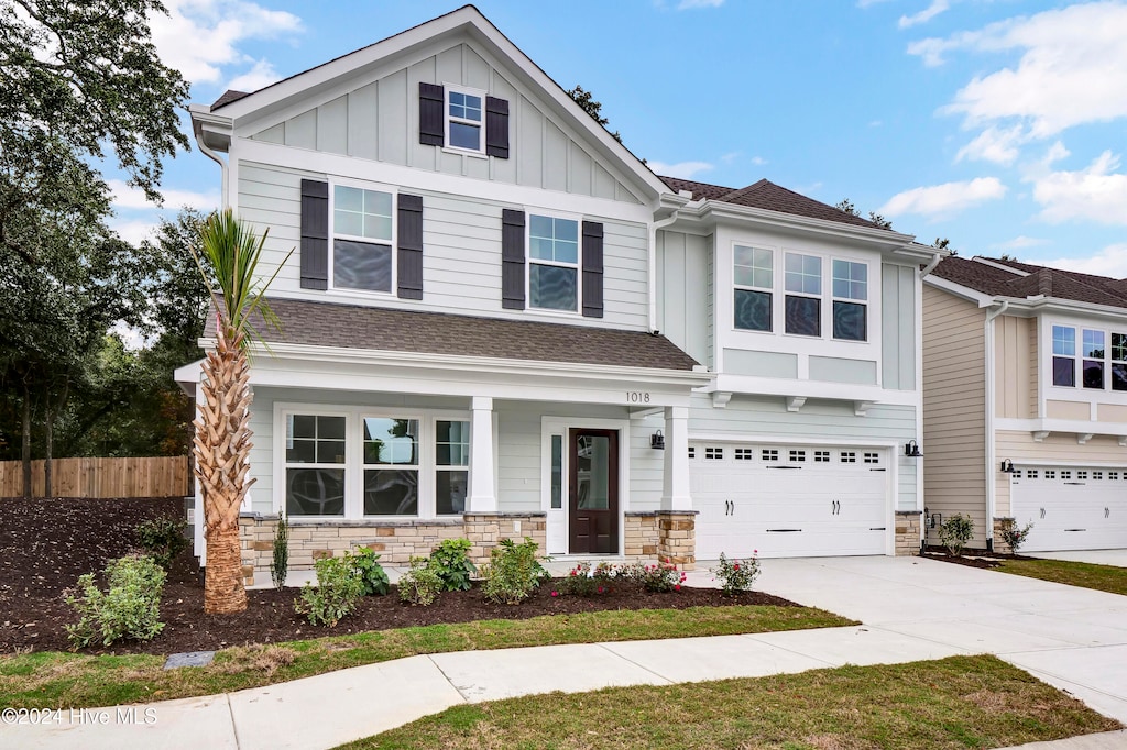 craftsman-style home with a garage