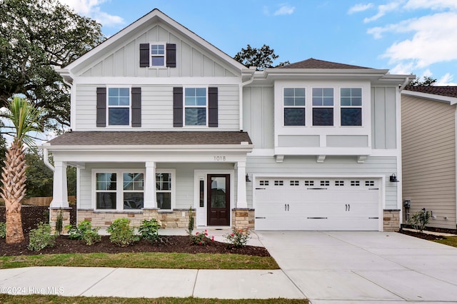 craftsman inspired home with a garage