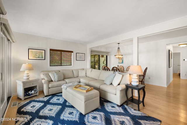 living room with light hardwood / wood-style flooring