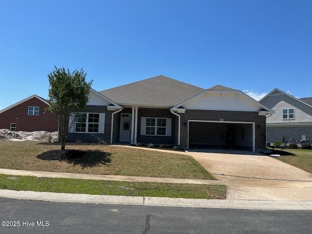 1254 Palatka Pl SE, Bolivia, NC 28422 - single story home with a garage, brick siding, driveway, and a front yard