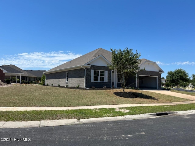 1254 Palatka Pl SE, Bolivia, NC 28422 - single story home with brick siding, a front yard, driveway, and an attached garage