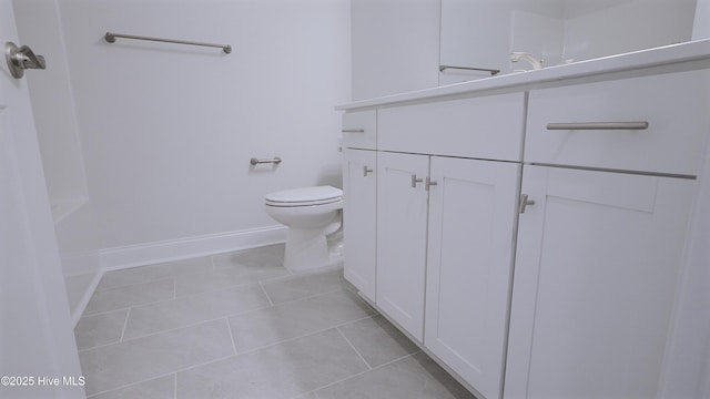 1254 Palatka Pl SE, Bolivia, NC 28422 - bathroom with vanity, toilet, tile patterned floors, and baseboards