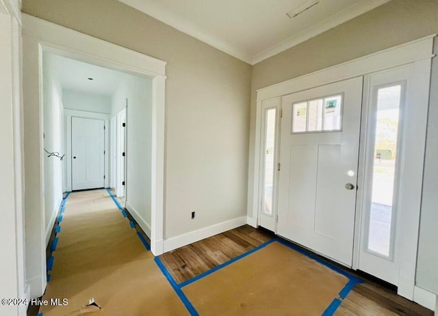 entryway with hardwood / wood-style flooring