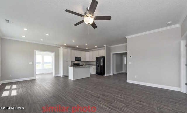 unfurnished living room with ceiling fan, dark hardwood / wood-style flooring, and ornamental molding