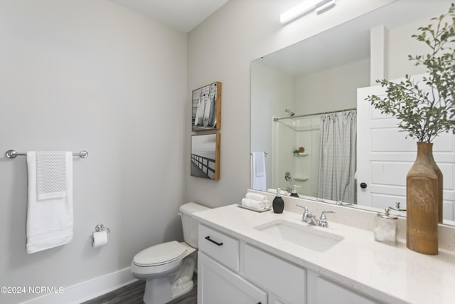 full bathroom with vanity, toilet, shower / tub combo, and wood-type flooring