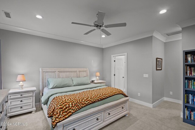 bedroom with light carpet, ceiling fan, and crown molding