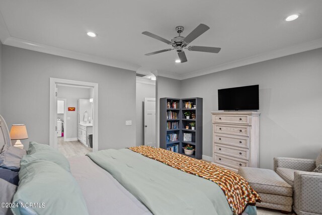 bedroom featuring light hardwood / wood-style floors, connected bathroom, ornamental molding, and ceiling fan