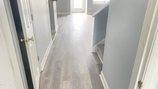 corridor featuring light wood-type flooring