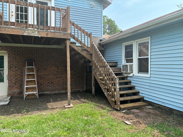 exterior space with cooling unit and a deck