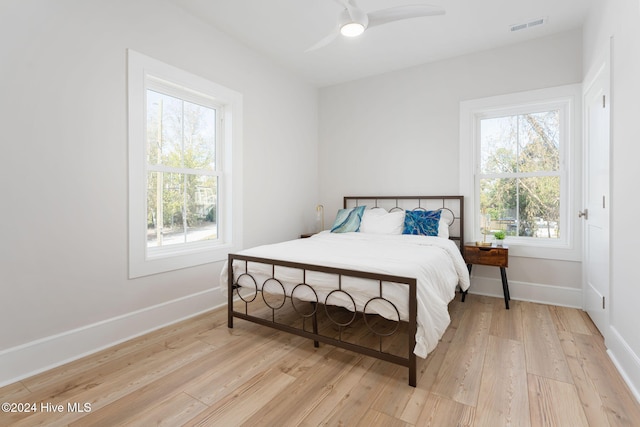 115 Seagate Pl, Wilmington, NC 28403 - bedroom with light wood-style flooring, baseboards, and ceiling fan