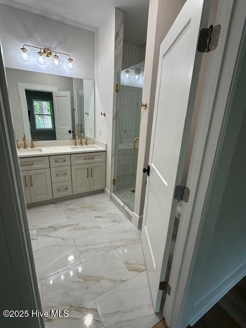 115 Seagate Pl, Wilmington, NC 28403 - full bathroom featuring double vanity, a shower stall, and marble finish flooring