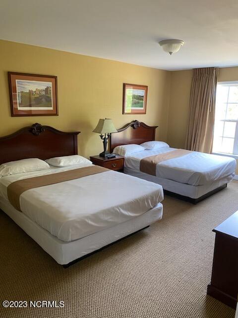 bedroom featuring carpet flooring