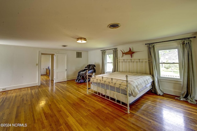 unfurnished bedroom featuring wood-type flooring