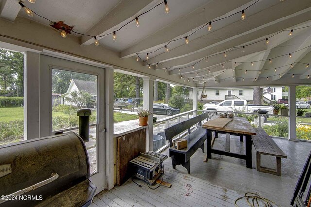 264 Main St, Swanquarter, NC 27885 - sunroom / solarium featuring track lighting and beam ceiling