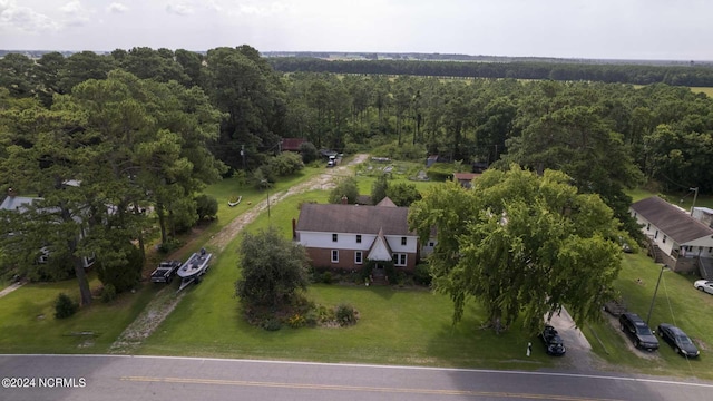 264 Main St, Swanquarter, NC 27885 - birds eye view of property featuring a wooded view
