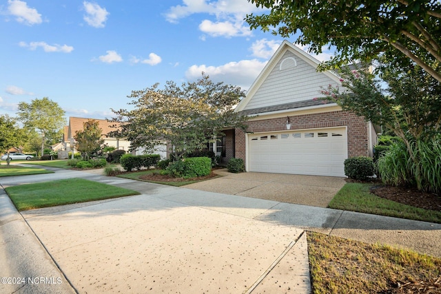 front of property with a garage