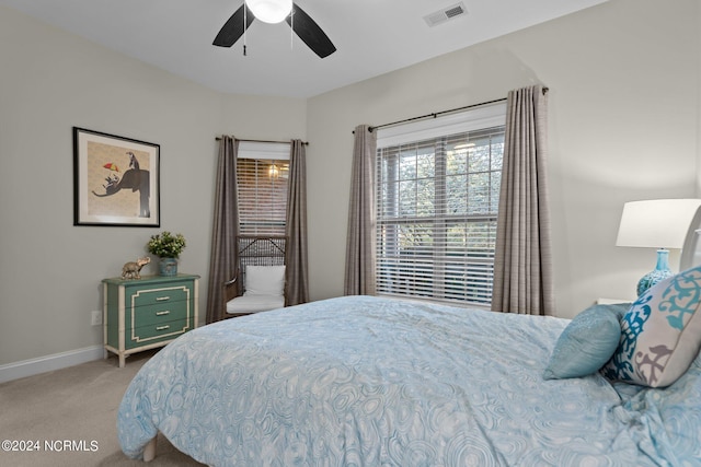 bedroom featuring ceiling fan and carpet flooring