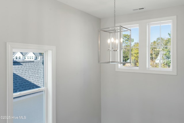 interior details with a chandelier