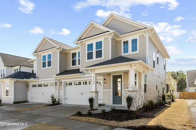 view of front of property featuring a garage