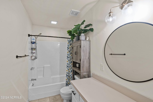 full bathroom with shower / tub combo with curtain, vanity, tile patterned flooring, and toilet