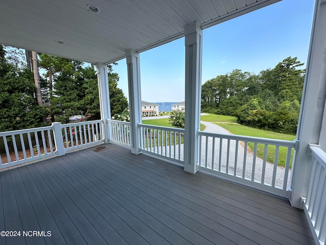 deck featuring a yard