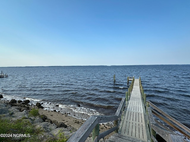 view of dock with a water view