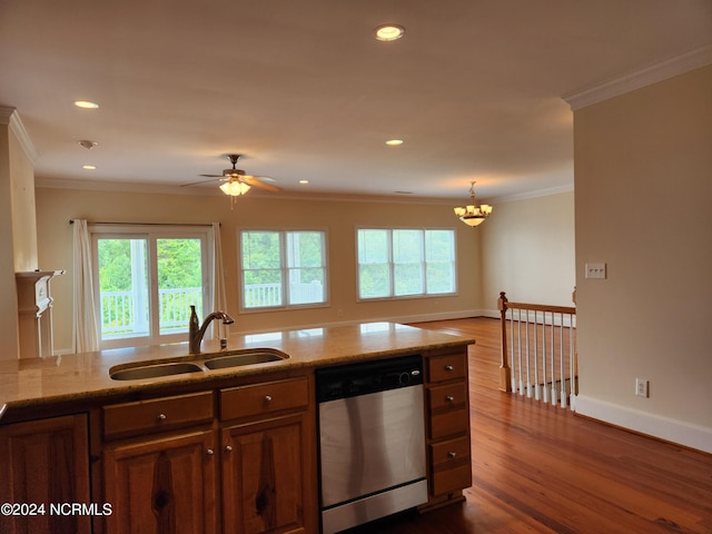 kitchen featuring ornamental molding, sink, stainless steel dishwasher, dark hardwood / wood-style floors, and light stone countertops