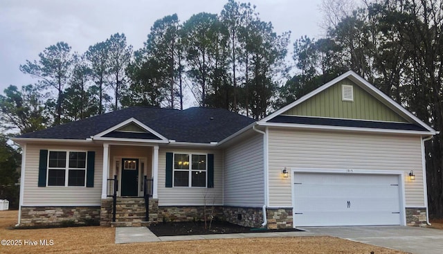 craftsman inspired home with a garage