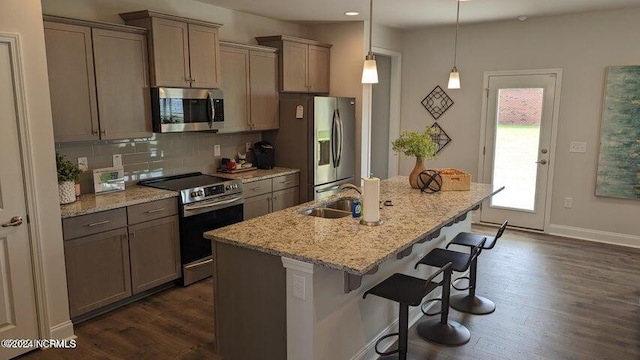 dining space with an inviting chandelier, crown molding, and dark wood-type flooring