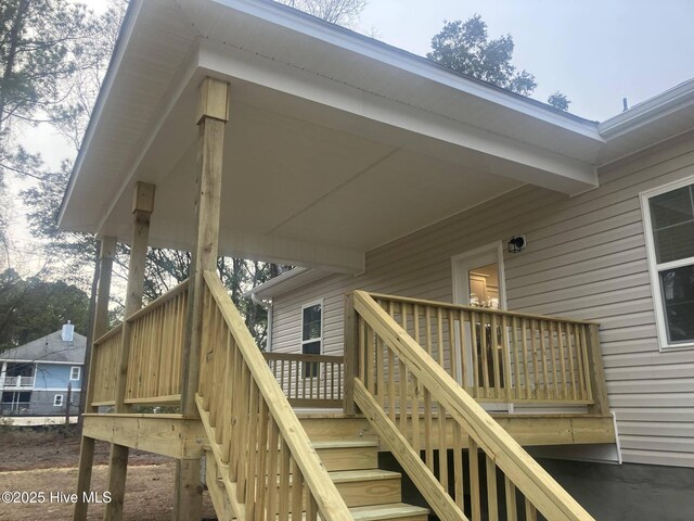 wooden deck featuring a gazebo