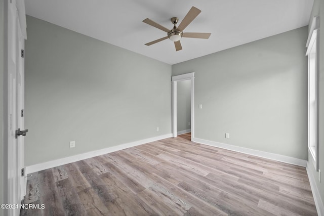 unfurnished bedroom featuring ceiling fan and light hardwood / wood-style floors