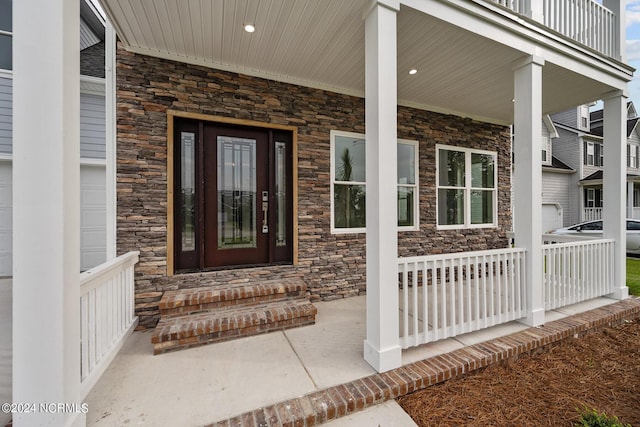 doorway to property with covered porch