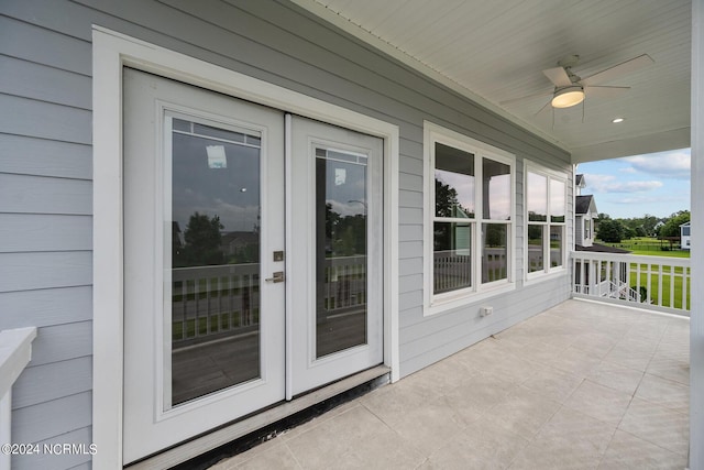 exterior space with ceiling fan and covered porch