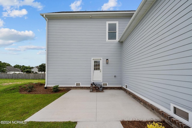 exterior space featuring a yard and a patio area