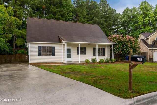 view of front of home with a front yard