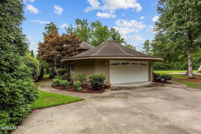 garage featuring driveway