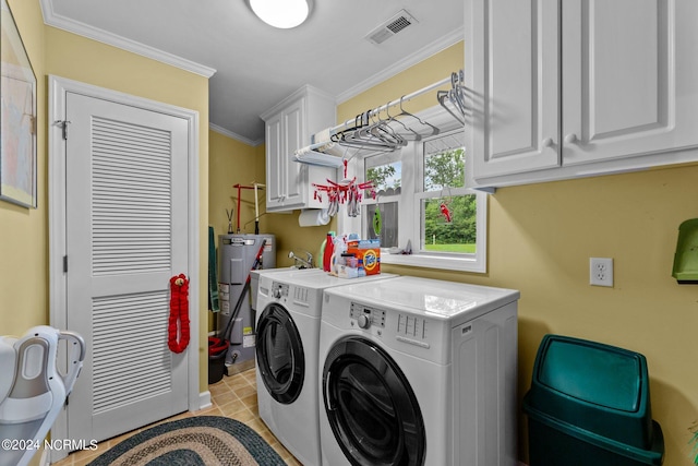 clothes washing area with separate washer and dryer, visible vents, water heater, ornamental molding, and cabinet space