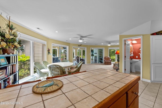 sunroom with visible vents and a sink