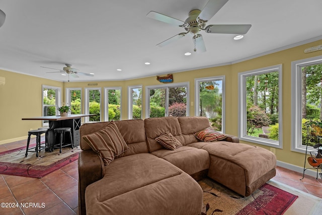 tiled living room featuring recessed lighting, plenty of natural light, and baseboards