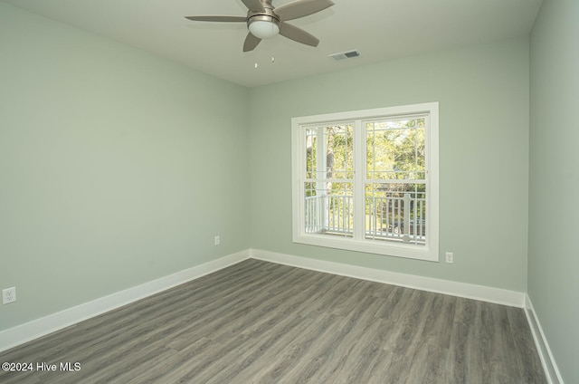 unfurnished room featuring hardwood / wood-style flooring and ceiling fan