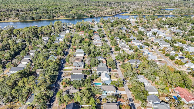 drone / aerial view with a water view