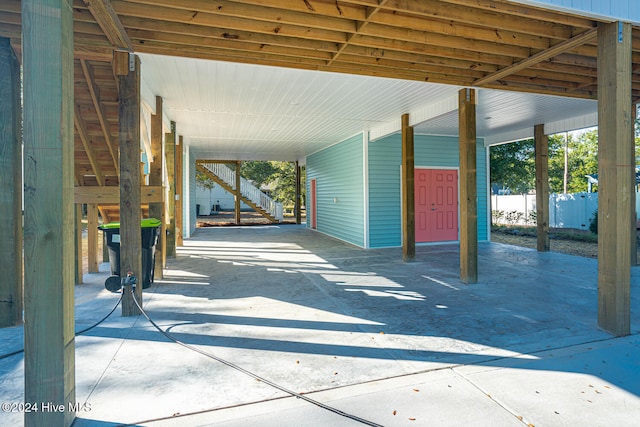 view of patio / terrace featuring a carport